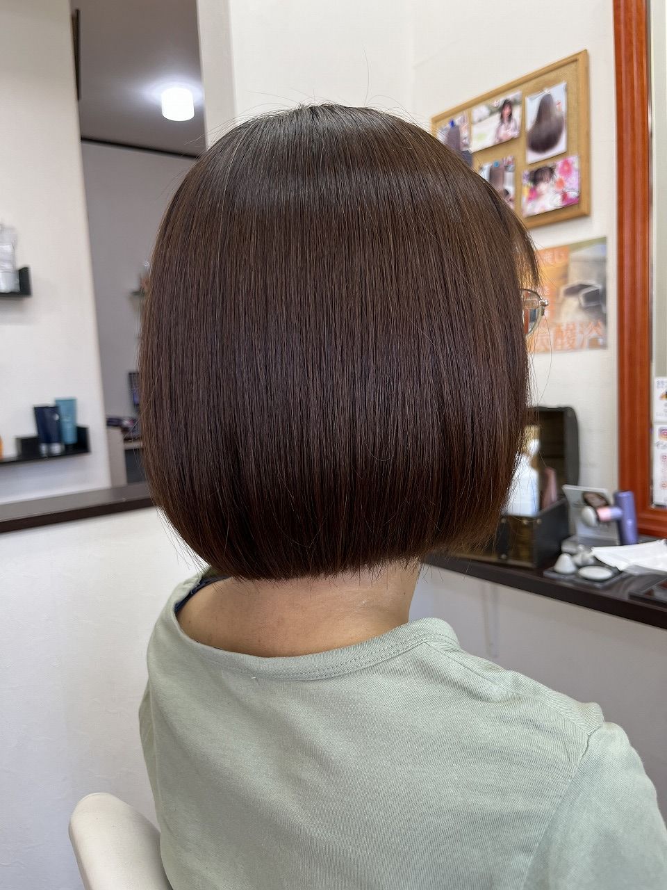 内に収まるようにカットされたボブスタイル（アフター）