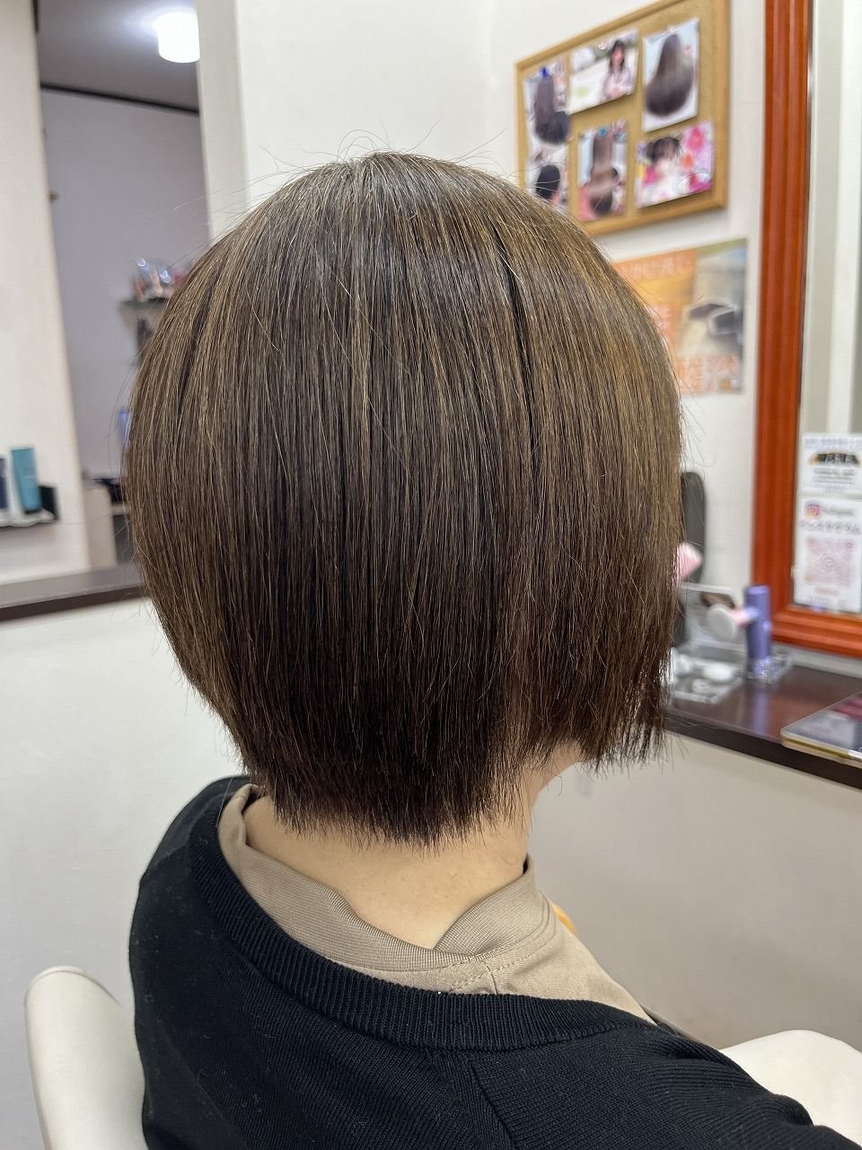 アフター写真。自然なストレートに仕上がった状態。