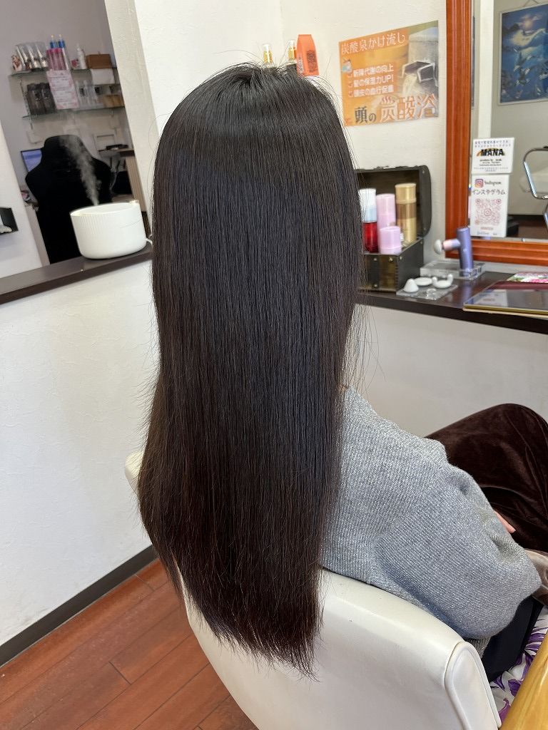縮毛矯正後に自然にまとまった髪の仕上がり